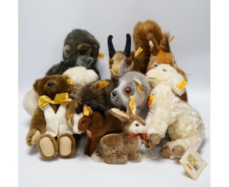 Thirteen Steiff yellow tag animals and one yellow tag bear, including Snorry fox, Mannie rabbit, Nagy beaver and Resi cow