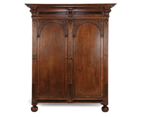 Antique oak gate cupboard with blackened elements and richly carved decor, Holland ca. 1700, 217 cm high, 186 cm wide, 73 cm 