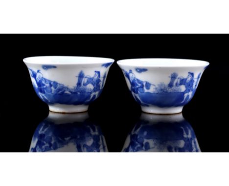 2 eggshell porcelain cups with blue decor of 2 merchants, with Chinese characters, bottom marked with wax stamp 'jwin' and 4-