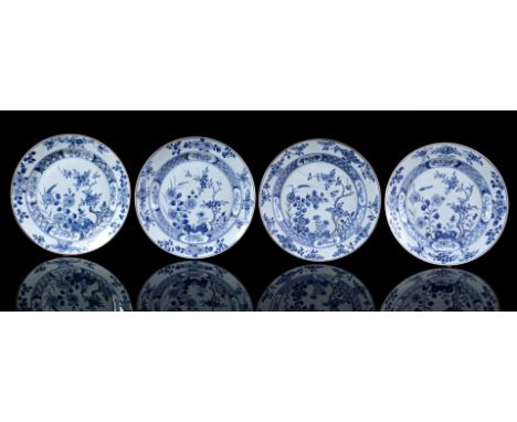 4 porcelain dishes with blue floral decor, China Kangxi/Yongzheng period ca 1725, 27.5 cm (1 dish with chip, 1 dish with edge