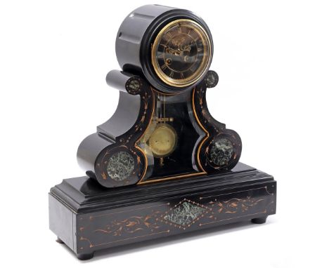 Marble mantel clock with brass details, facet cut glass, engraved gold colored decor of patterns and dial with Roman numerals