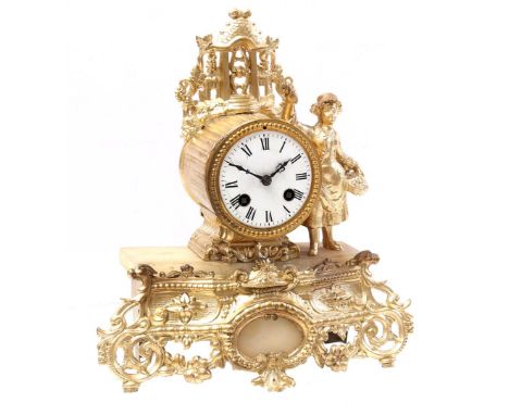 Gold-coloured zamac mantel clock with a lady with a bouquet, 29 cm high