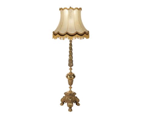 Brass richly decorated 2-light floor lamp with pig's bladder shade, 173 cm high