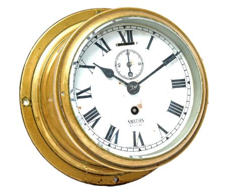 English ship's clock, marked Smiths Empire, in brass case, first half of the 20th century, 20.5 cm in diameter