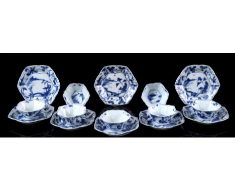 7+8 porcelain hexagonal cups and saucers with blue and white decoration of landscape and fisherman, China Kangxi period ca. 1