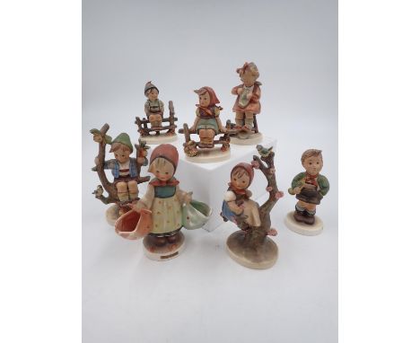 Group of seven Goebel figures, largest H: 15cm. Not available for in-house P&amp;P