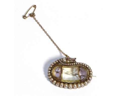 A Victorian Amethyst, Citrine and Seed Pearl Snake Brooch, and oval centre formed of a calibré cut citrine between two amethy