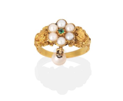 A Pearl, Emerald and Diamond Sweetheart Ring, an emerald within a cluster of seed pearls to a carved shank depicting pomegran