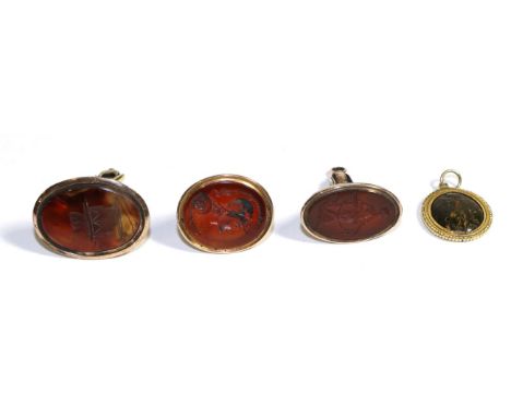 Three Georgian Carnelian Set Intaglio Seals, depicting the bust of Mars, an allegory of hope and a chest, and A Carved Oval H