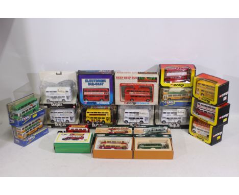 Corgi - 16 boxed diecast model buses from various Corgi ranges. Lot includes Corgi 'The Beatles Album Cover Collection - Revo