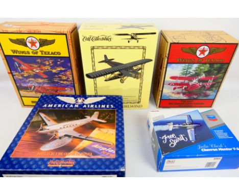 Auto World - Ertl Collectibles - Five boxed diecast model aircraft in various scales. Lot includes Auto World CP5902 Julie Cl