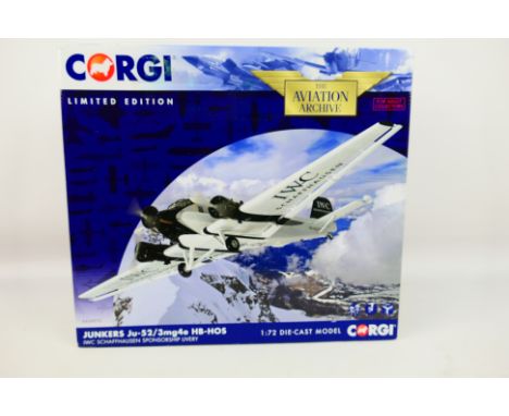 Corgi - A limited edition 1:72 scale Junkers Ju-52/3mg4e HB-HOS in IWC Schaffenhausen livery # AA36910. The model appears Min