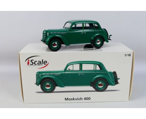 i-Scale - A boxed 1:18 scale i-Scale Moskvich 400. The model in green appears to be in Mint condition, housed within a Mint w