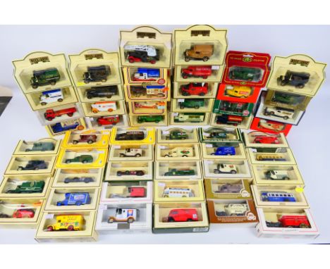 Lledo - A boxed collection of 55 diecast model vehicles from Lledo. Lot includes #39002 1934 Mack Truck 'Gas Light & Gas Coke