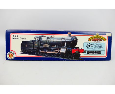 Bachmann - A boxed Bachmann OO gauge #31-300 Manor Class 4-6-0 steam locomotive and tender, Op.No.7802 'Bradley Manor' in GWR