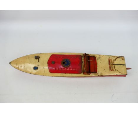 Hornby - A vintage clockwork Hornby Condor Speedboat, approximately 42 cm long. The motor is working but there are corrosion 