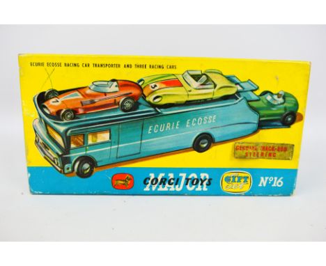 Corgi - GS 16 - A boxed Ecurie Ecosse racing car transporter with three cars set # GS16. The dark blue transporter has yellow