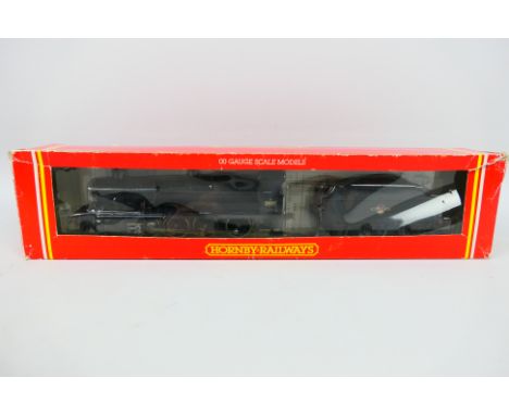 Hornby - A boxed Hornby R143 OO gauge 2-8-0 Class 2800 steam locomotive and tender Op.No.2857 in BR wartime black livery. Mod