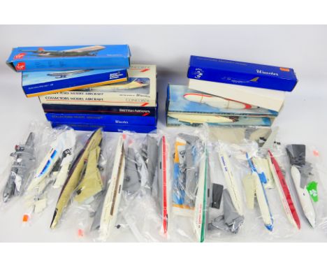 Wooster - Others - A mixed collection of 21 plastic commercial airline model aircraft kits in various scales (10 of which are