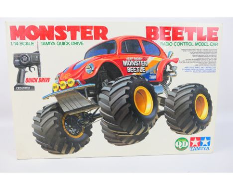 Tamiya - A boxed Tamiya #46006 1:14 scale Tamiya Quick Drive 'Monster Beetle' Radio Control Model car. The car comes with 2 c