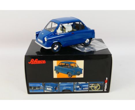 Schuco - A boxed Schuco 1:18 scale Limited Edition #450009900 Zundapp Janus. The model in blue has a very small loose chrome 