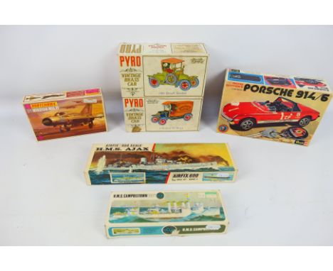 Revell - Pyro - Matchbox - Airfix - A group of part made vintage model kits, empty boxes and instructions and spare parts. In