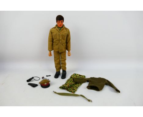 Palitoy - Action Man - A 1978 Action Man action figure with Flock hair and eagle eyes in a British Army Officer Uniform. The 