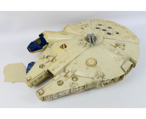 Kenner - Star Wars - An unboxed vintage Star Wars Millennium Falcon from 1979. This item is playworn with with discolouration