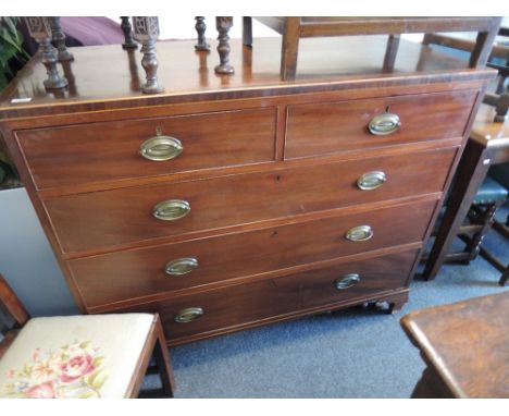 An early 19th century George III mahogany chest of 2 short and 3 long cockbeaded drawers on bracket feet
