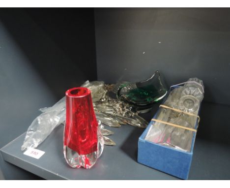 A selection of glassware including light drops, art glass vase, and condiment bottles