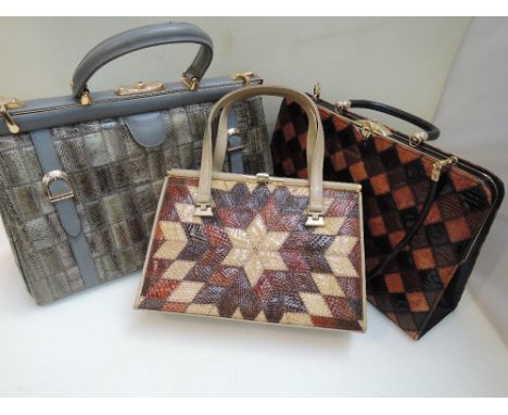 Three vintage snakeskin handbags including an Eros bag having a shades of brown chequered design, a large grey bag by Allan S