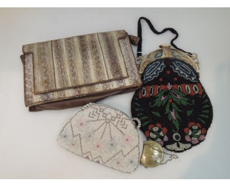 A vintage snake skin and leather clutch bag and two beaded evening bags