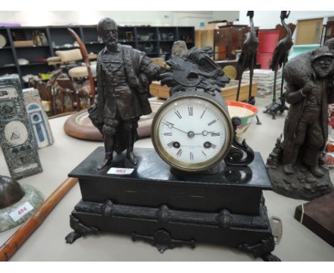 A Victorian mantel clock by Manoah Rhodes & Co having chiming movement with circular enamel dial and mounted cast applique fi