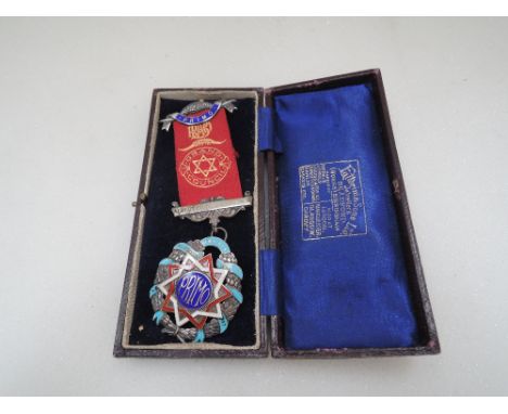 An HM silver Masonic primo jewel regarding Albert Edward Lodge no 19 presented to Brother R Disley in 1927