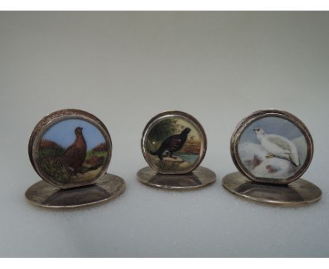 Three silver place/menu holders having circular enamelled pictures of Grouse, Chester 1906, Sampson Mordan &amp; Co, Reg no 4