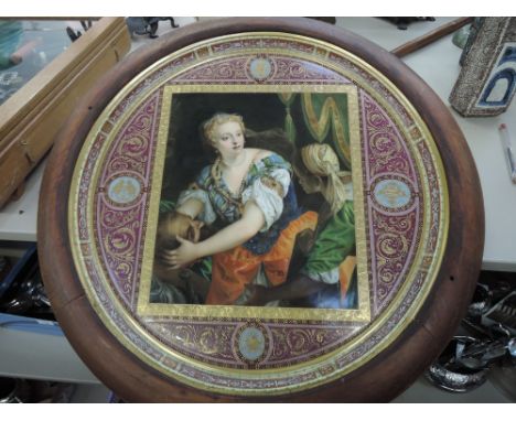 A Vienna 19th century circular ceramic plaque entitled Judith, having gilt heightened pictorial portrait after P Veronese, Ga