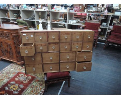 A set of vintage pine multi spice drawers