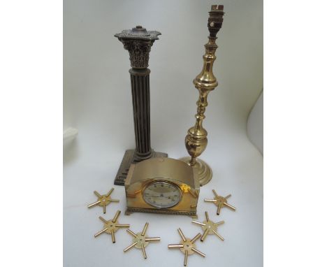 A vintage brass table lamp of corinthian column design, a modern brass table lamp, an early 20th century brass mantel clock b