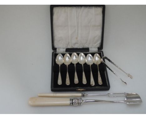 A cased set of six HM silver teaspoons of plain form, a pair of HM silver sugar nips, a plated stilton scoop and pickle fork