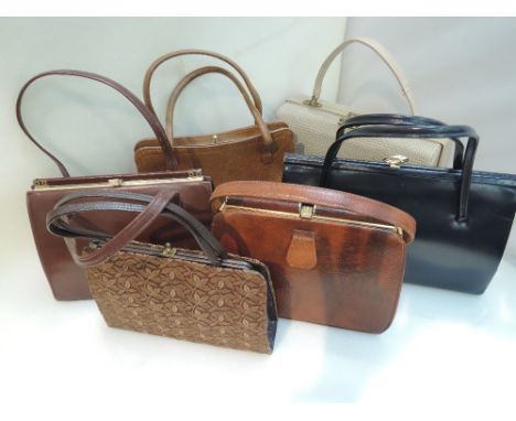 Six vintage handbags including navy and tan leather, brown lace overlaid and woven barrel style