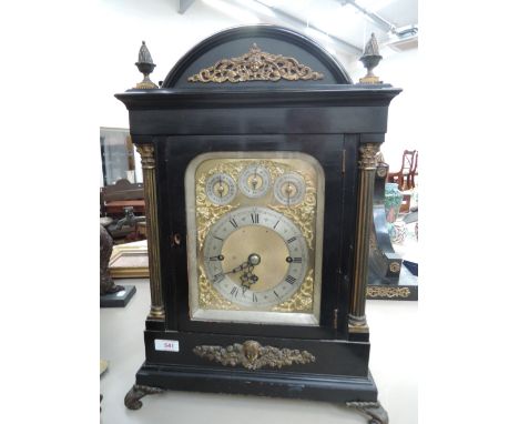 A Victorian bracket clock in the 18th century style having ebonized case and gilt effect applique with acorn finial and corin