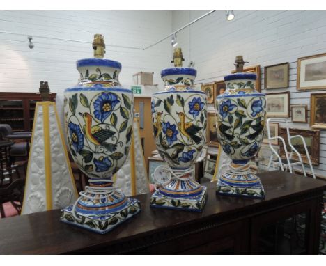 Three modern ceramic table lamps designed as three Spanish Majolica style vases