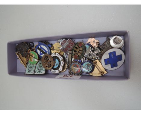 A small selection of metal and enamel badges, cufflinks, lapel badges etc including HM silver 