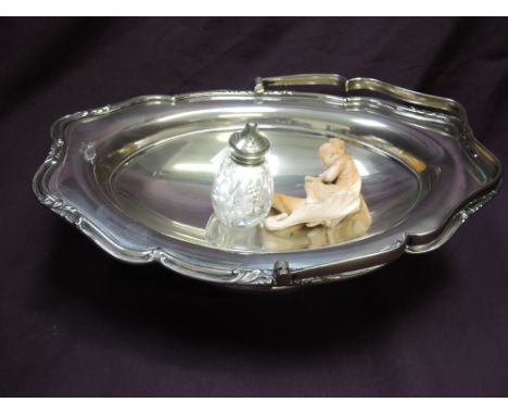 An EPNS comport, a meersham pipe modelled as lady reading, and a plated and glass condiment