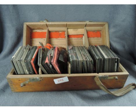 A box of Magic Lantern slides including cycling and vintage motorcycling interest