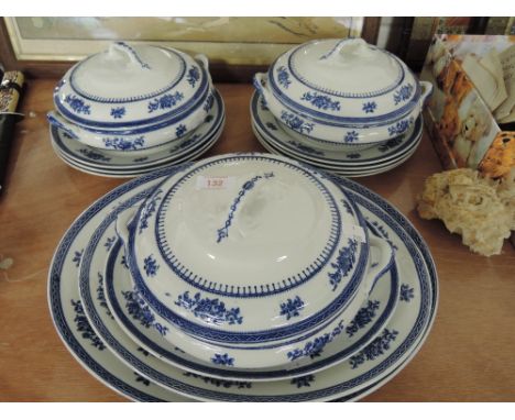 A part tea dinner service by Losol ware in a blue and white delft style plates tureens chargers etc