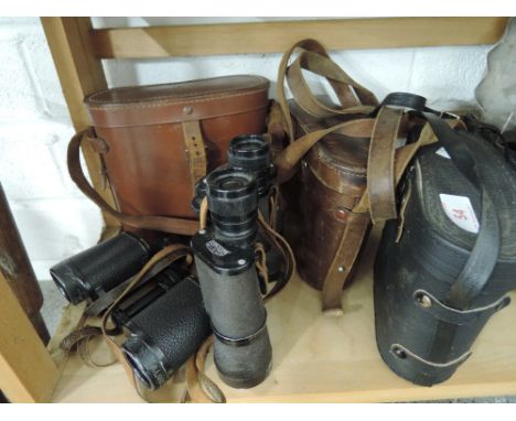 A selection of vintage binoculars including Boots Pacer, Carl Zeiss Deltrintem and Aquilus