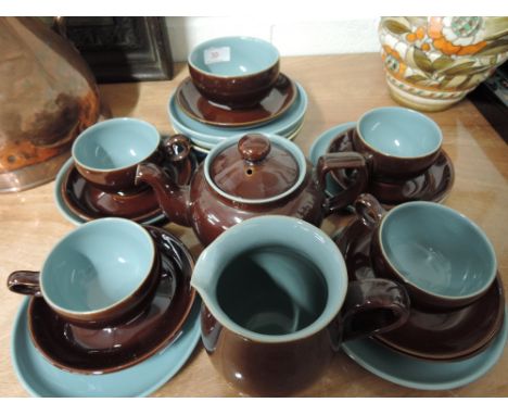 A vintage part tea coffee service by Denby in an attractive baby blue and brown with curved shape cups jug tea pot etc