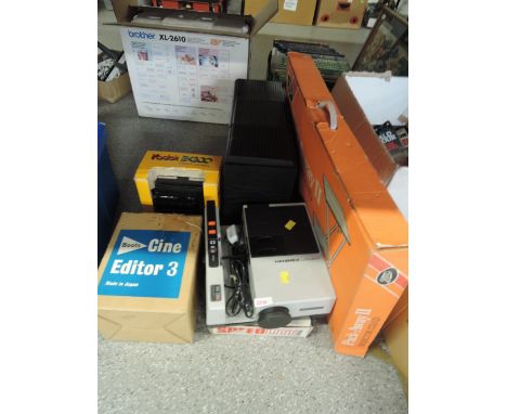 A Hanimex La Ronde eft slide projector and Boots pack-away projector stand, a Boots Cine Editor 3 in original box, a Kodak EK