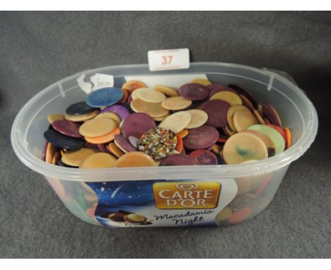 A selection of vintage early plastic and bakelite tiddleywinks games counters and tokens 